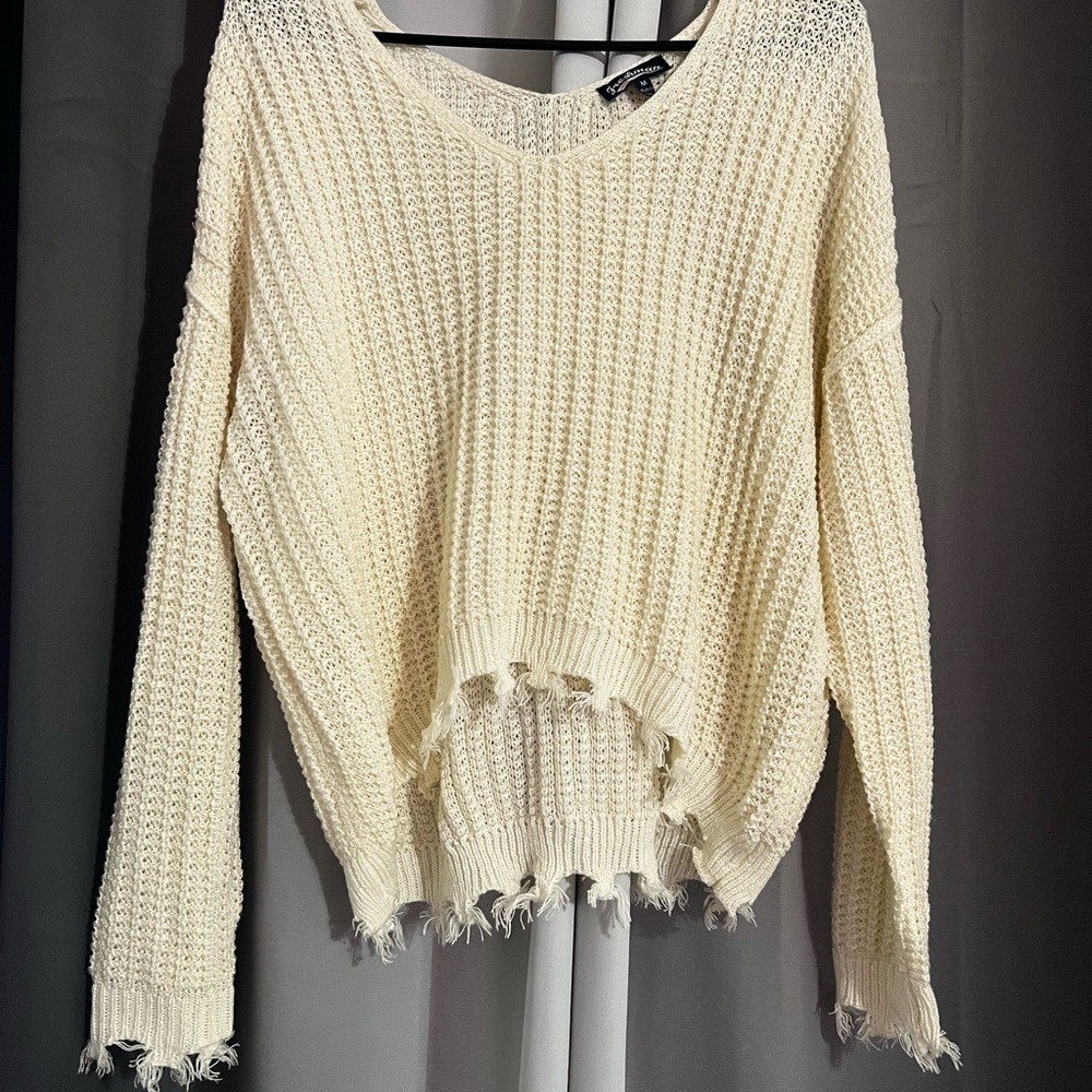 Cream V-Neck Chunky Knit Sweater with Distressed Hem
